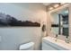 This bathroom features a gray color scheme and modern design at 1025 Zang St, Golden, CO 80401