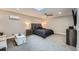 Cozy main bedroom features a ceiling fan, a skylight, and is nicely decorated at 1025 Zang St, Golden, CO 80401