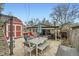 Relaxing patio area with outdoor dining set and BBQ, perfect for entertaining and leisure at 1025 Zang St, Golden, CO 80401