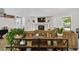 Cozy living room with a fireplace and shelves decorated with various items at 7440 Quail St, Arvada, CO 80005