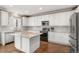 Kitchen with granite counters, subway tile backsplash, and stainless steel appliances at 4221 Pioneer Pl, Brighton, CO 80601