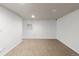 Spacious basement with plush carpeting, white walls, and ample room for various activities, perfect for customization at 2333 Paint Pony Cir, Castle Rock, CO 80108