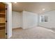 Cozy carpeted bedroom with a window, closet and neutral paint, ready for personalization at 2333 Paint Pony Cir, Castle Rock, CO 80108