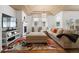 Comfortable living room with fireplace, hardwood floors, and natural light at 2333 Paint Pony Cir, Castle Rock, CO 80108
