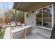Covered patio with comfortable seating, perfect for outdoor relaxation and entertaining guests at 2333 Paint Pony Cir, Castle Rock, CO 80108