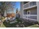 Charming backyard featuring a fire pit, seating, and a fenced yard, ideal for relaxation at 1403 Valentia St, Denver, CO 80220