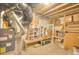 Basement storage area with shelving, a furnace and plenty of room for organization at 735 Woodmoor Acres Dr, Monument, CO 80132