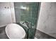 Modern bathroom features a luxurious soaking tub and a sleek, tiled shower area at 735 Woodmoor Acres Dr, Monument, CO 80132