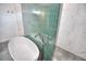 Modern bathroom featuring a freestanding tub, glass shower with decorative tiles, and sleek fixtures at 735 Woodmoor Acres Dr, Monument, CO 80132