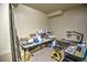 Functional craft room is spacious with ample workspace, ideal for creative projects and hobbies at 735 Woodmoor Acres Dr, Monument, CO 80132
