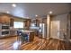 Large kitchen featuring stainless steel appliances, granite countertops, and a central island at 735 Woodmoor Acres Dr, Monument, CO 80132