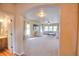 An open-concept living room featuring lots of light, comfortable seating and a ceiling fan at 735 Woodmoor Acres Dr, Monument, CO 80132