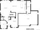 Floor plan showcasing the main level layout, including the living room, kitchen, and garage at 735 Woodmoor Acres Dr, Monument, CO 80132
