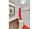 Bathroom features a shower-tub combo and a granite countertop at 8747 E Dry Creek Rd # 1623, Englewood, CO 80112