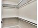 Walk-in closet with shelving for organized storage at 8747 E Dry Creek Rd # 1623, Englewood, CO 80112