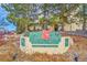 Saddle Ridge community sign surrounded by mature trees and landscaping in a well-maintained HOA community at 8747 E Dry Creek Rd # 1623, Englewood, CO 80112