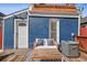 Backyard featuring an outdoor seating area and a home air conditioner at 1144 S Logan St, Denver, CO 80210