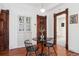 Classic dining space with built-in hutch, wooden door, and an inviting ambiance at 1144 S Logan St, Denver, CO 80210
