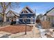 Beautiful home featuring unique architectural details, a cozy front yard, and a well-maintained exterior at 1144 S Logan St, Denver, CO 80210