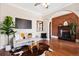 Inviting living room showcasing hardwood floors, a decorative fireplace, and stylish contemporary furnishings at 1144 S Logan St, Denver, CO 80210