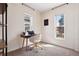 Bright home office with desk, chair, and natural light at 1144 S Logan St, Denver, CO 80210