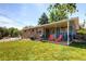 Charming backyard patio with seating, perfect for outdoor relaxation and entertainment at 7106 Reed Cir, Arvada, CO 80003