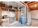 Unfinished basement area with exposed ductwork and utilities, ready for customization at 7106 Reed Cir, Arvada, CO 80003