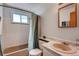 Functional bathroom with a combined bathtub and shower at 7106 Reed Cir, Arvada, CO 80003