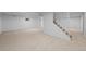 Spacious finished basement with plush carpet and neutral colors at 7507 Braun St, Arvada, CO 80005