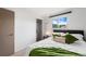 Comfortable bedroom with a large window, closet, and plush carpet offering a quiet retreat at 7507 Braun St, Arvada, CO 80005