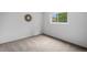 This bright carpeted bedroom offers neutral walls, a window for natural light, and a calming atmosphere at 7507 Braun St, Arvada, CO 80005