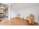 Bright, airy bonus room with wood-look floors and natural light at 7507 Braun St, Arvada, CO 80005