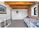Bright bedroom features carpet, log wall accents, white accents, and a spacious closet storage at 1651 Pine Valley Rd, Evergreen, CO 80439