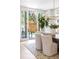 Elegant dining room with patio access, showcasing natural light and a modern aesthetic at 510 Glencoe St, Denver, CO 80220