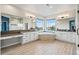 Luxurious bathroom with double vanity, soaking tub, and large windows at 11584 Pine Canyon Ln, Parker, CO 80138