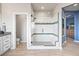 Modern bathroom features a glass-enclosed shower and tiled accents at 11584 Pine Canyon Ln, Parker, CO 80138