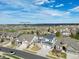 Street view of neighborhood showcasing mature landscaping and beautiful views of the Black Bear Golf Club at 11584 Pine Canyon Ln, Parker, CO 80138