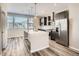 Modern kitchen with stainless steel appliances and island at 9654 Browns Peak Cir, Littleton, CO 80125