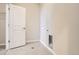 Functional laundry area with tile flooring and washer/dryer hookups at 9654 Browns Peak Cir, Littleton, CO 80125