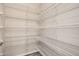 Walk-in pantry featuring white wire shelving at 9654 Browns Peak Cir, Littleton, CO 80125