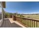 Deck with open views of the surrounding area at 7851 S Quatar Ct, Aurora, CO 80016