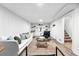 Finished basement featuring a cozy living area with white walls and neutral accents at 2955 Poplar St, Denver, CO 80207