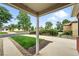 Charming front yard view from the porch with well-kept lawn and mature landscaping at 2955 Poplar St, Denver, CO 80207