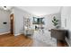 Inviting living room with hardwood floors, contemporary decor, and natural light at 2955 Poplar St, Denver, CO 80207