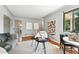 Cozy living room with stylish decor, hardwood floors, and lots of natural light at 2955 Poplar St, Denver, CO 80207