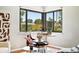 Bright sitting area with large window offering a lovely outdoor view at 2955 Poplar St, Denver, CO 80207