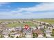 Aerial view of a neighborhood featuring single-Gathering homes and green space in a suburban community at 8234 S Vandriver Way, Aurora, CO 80016