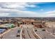 Luxury community aerial view highlighting the pool and recreational facilities with beautiful landscaping at 8234 S Vandriver Way, Aurora, CO 80016