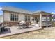 Back patio has great space for grilling and outdoor dining at 8234 S Vandriver Way, Aurora, CO 80016