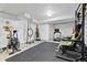 Finished basement area, perfect for home gym with workout equipment at 8234 S Vandriver Way, Aurora, CO 80016